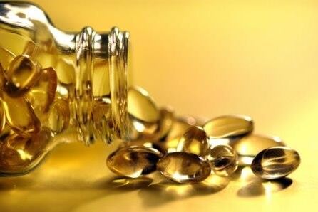 Láhev s vitamíny ke zvýšení účinnosti